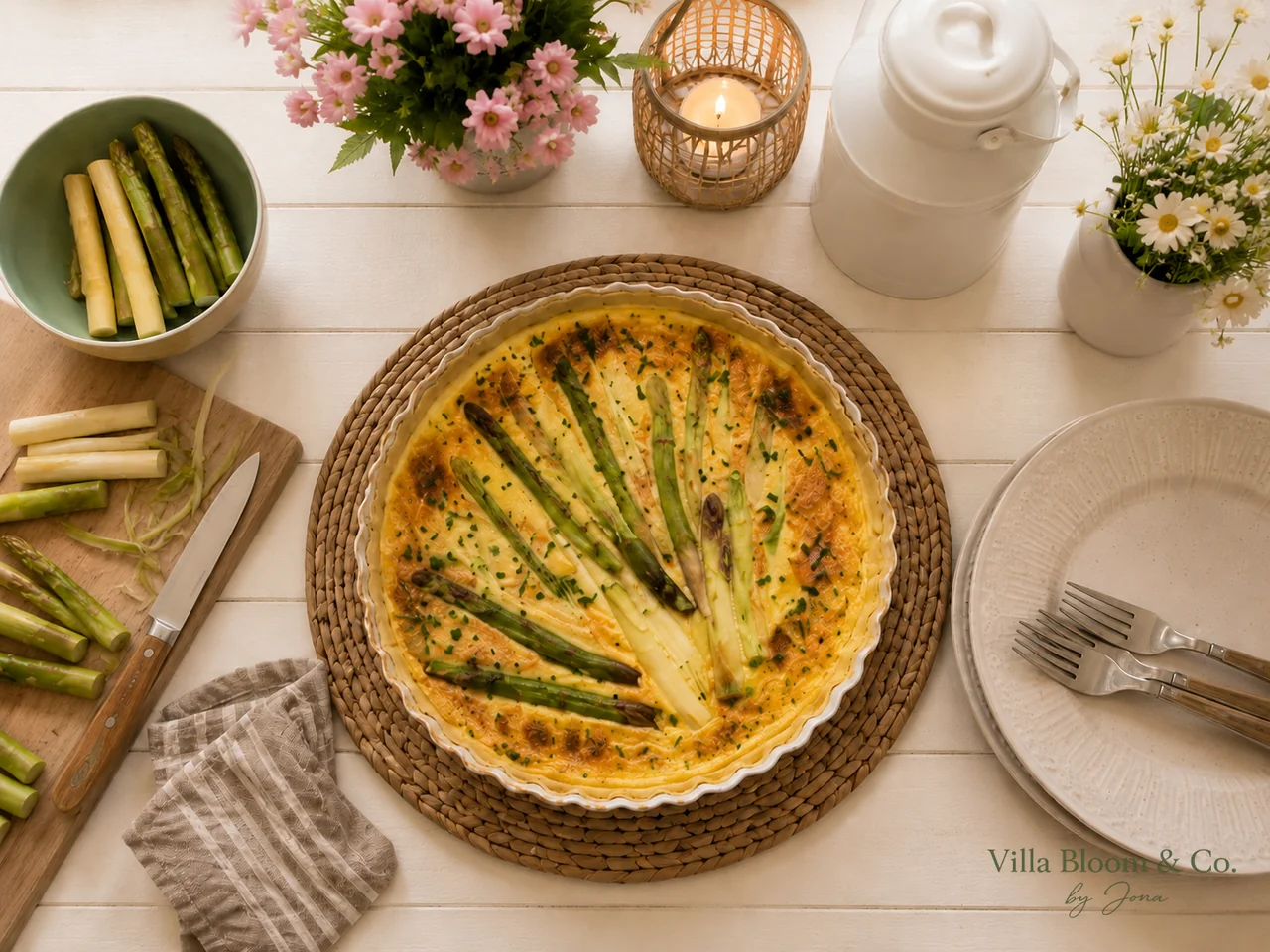 Asparagus quiche from above with fan-arranged asparagus and chives